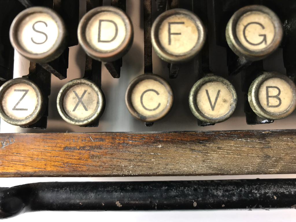 Well worn wooden space bar