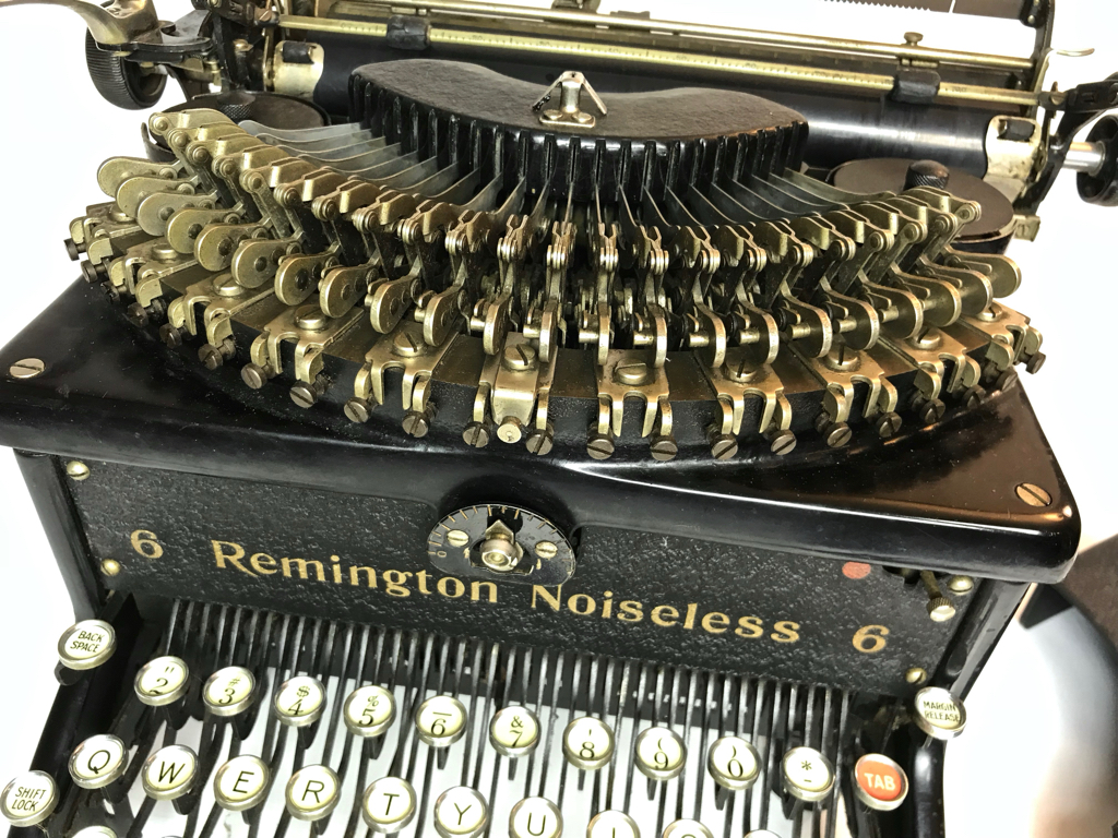 The thrust action of the key levers produces a quieter impact and less noise than conventional typewriters.