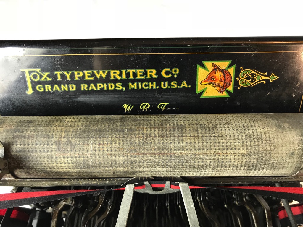 Decals on paper tray are in excellent condition