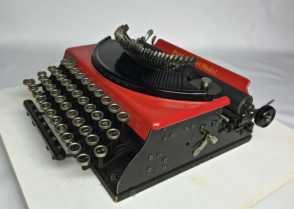 Right side quarter view with keys raised to typing position